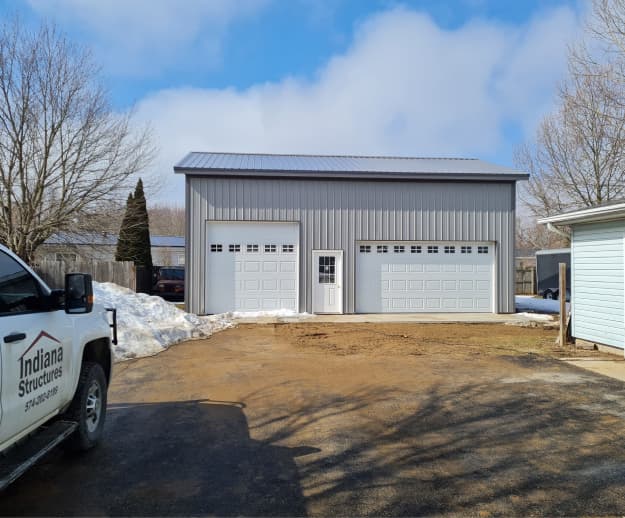 Garage with Indiana Structures truck